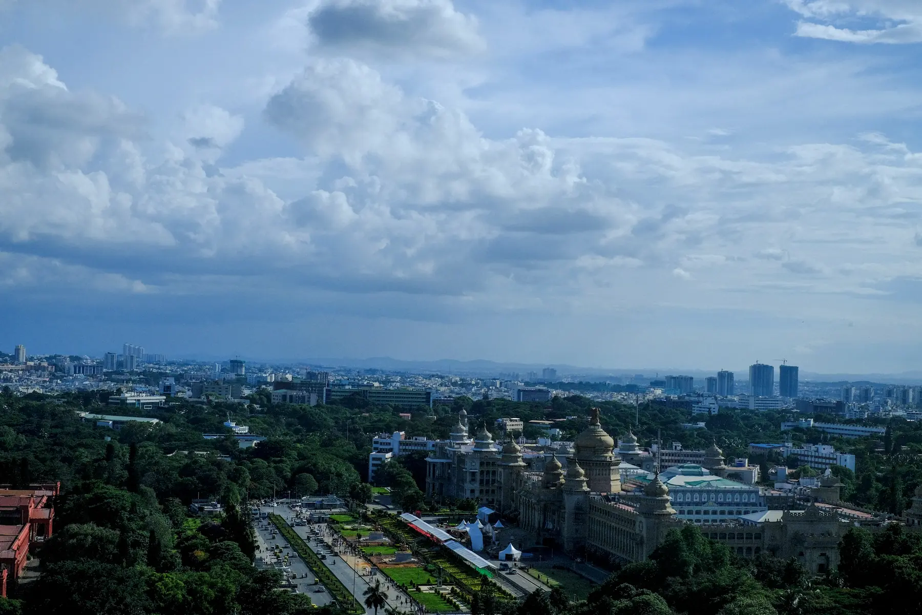 The Bengaluru skyline behind the Vidhana Soudha and its gardens