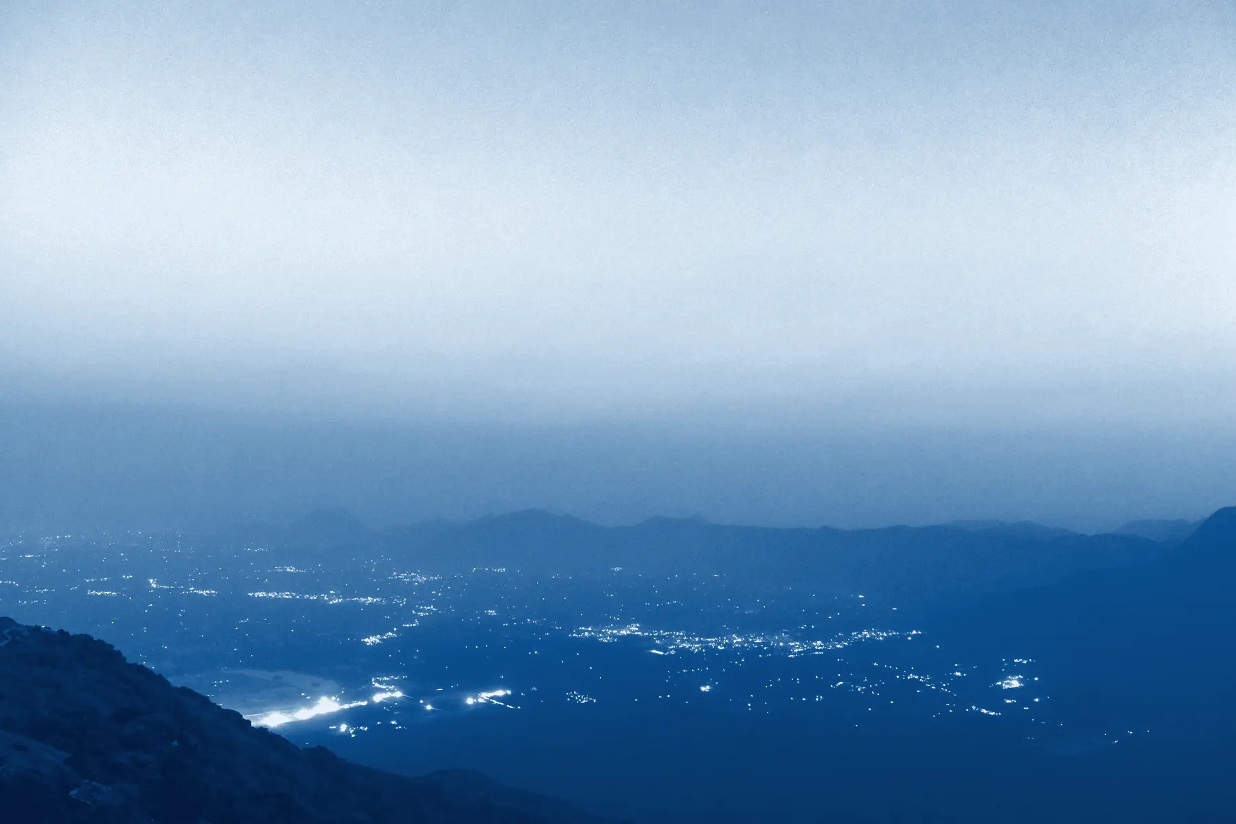 Coimbatore city lights at dusk, seen from the Vellingiri hills